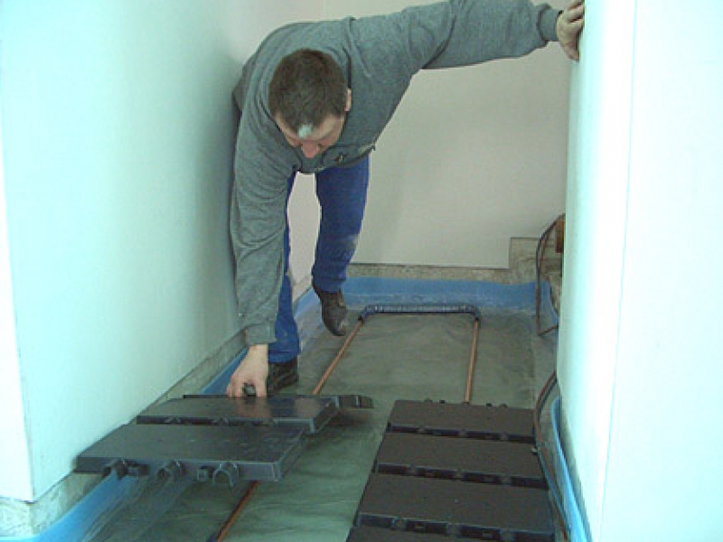 Verlegen der Heizflächenabdeckungen