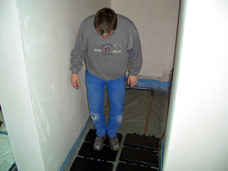 Verlegen der Heizflächenabdeckungen